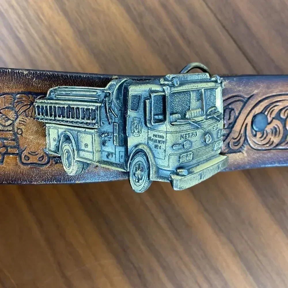 Vintage brown leather hand tooled Western belt.